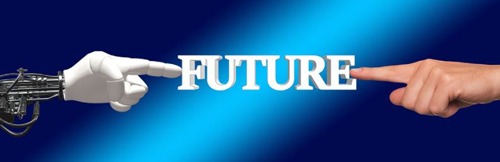 A human finger and a robot finger pointing towards the word “future”