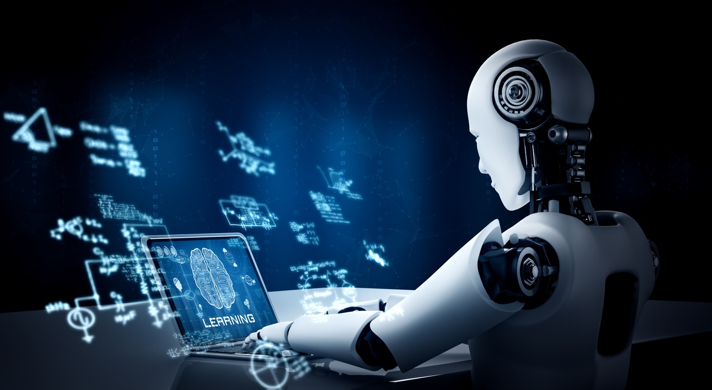 Humanoid robot uses laptop