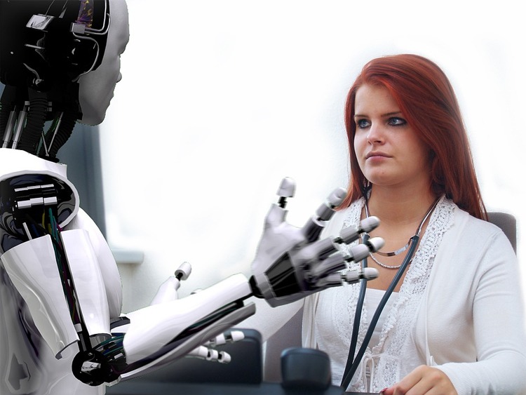 a robot talking with a woman