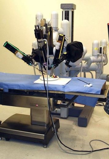 A laparoscopic robotic surgery machine. Patient-side cart of the da Vinci surgical system.
