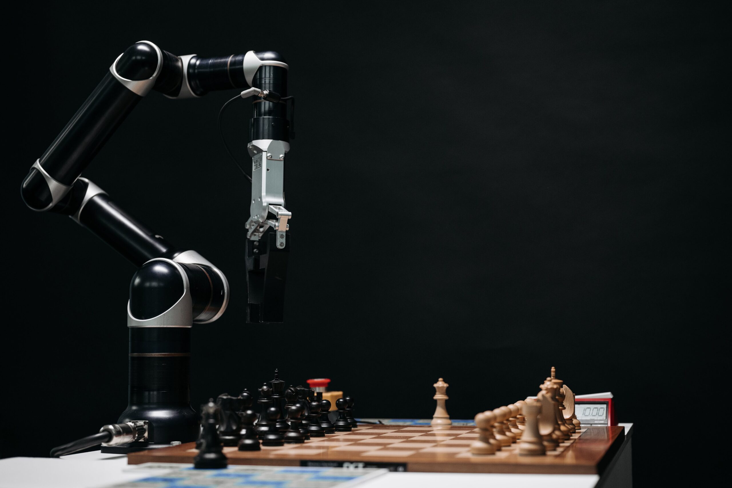 a robotic arm and a chessboard