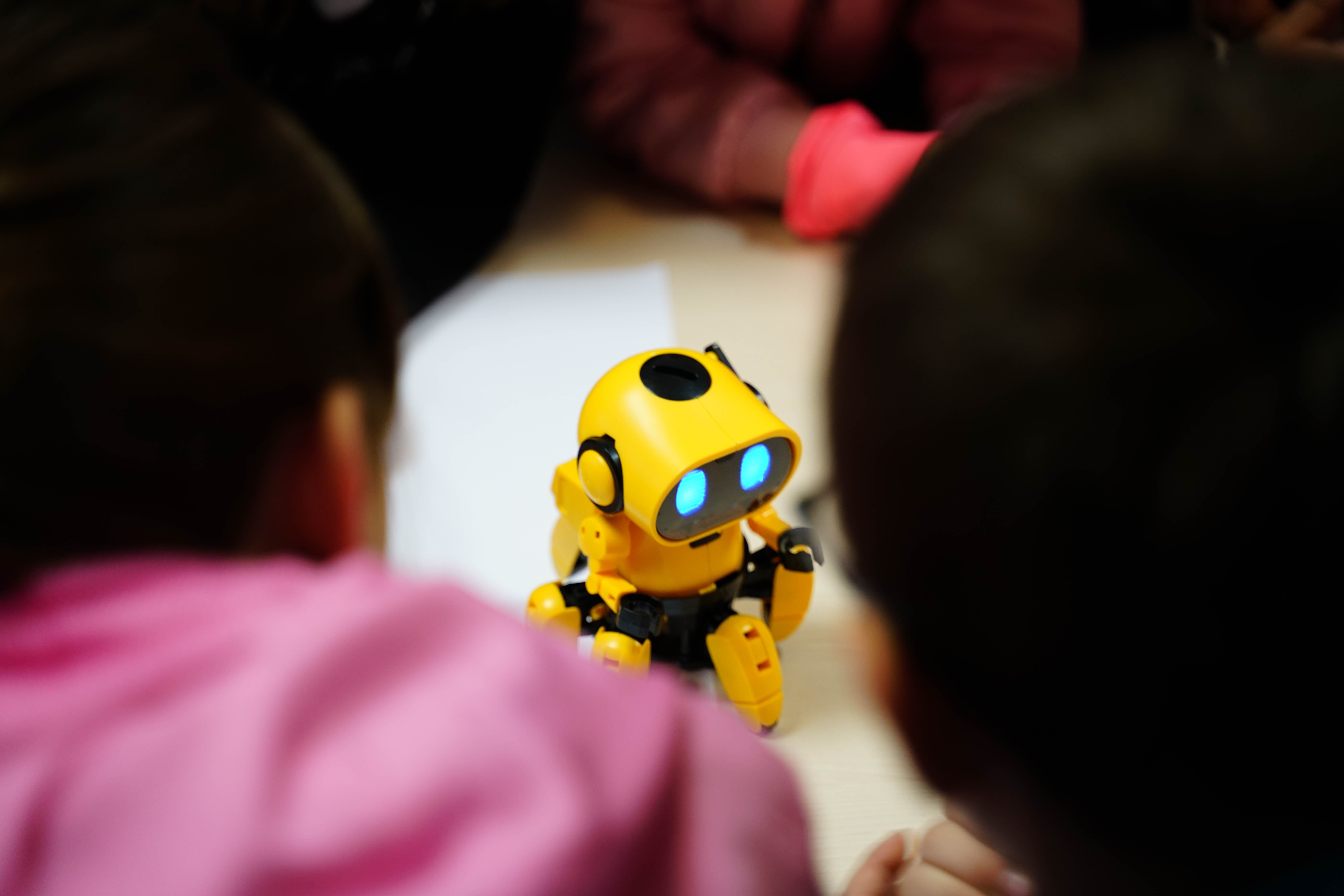 a yellow toy robot